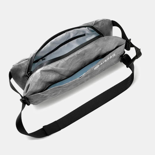 AIRPAQ Umhängetasche Slingbaq grau