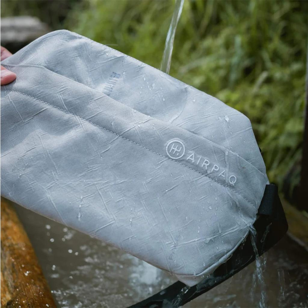 AIRPAQ Umhängetasche Slingbaq grau
