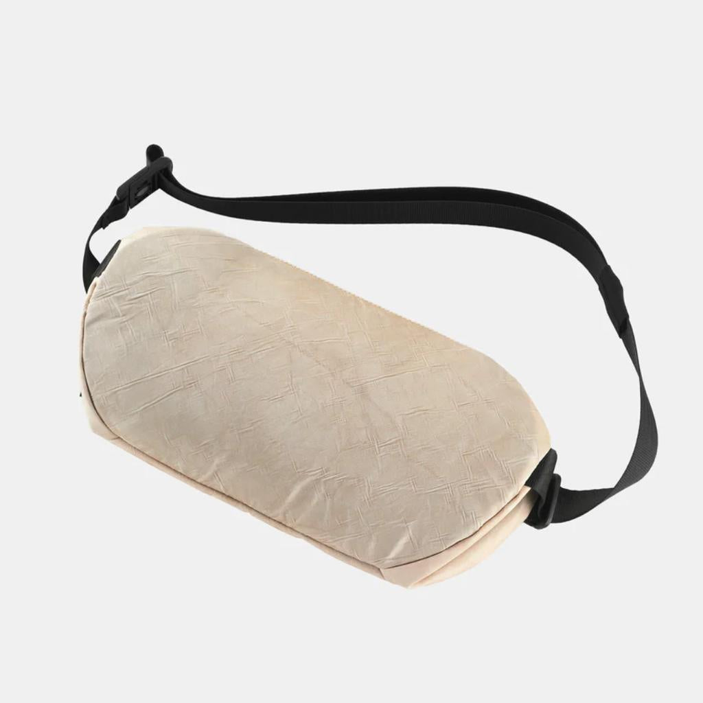 AIRPAQ Umhängetasche Slingbaq sand